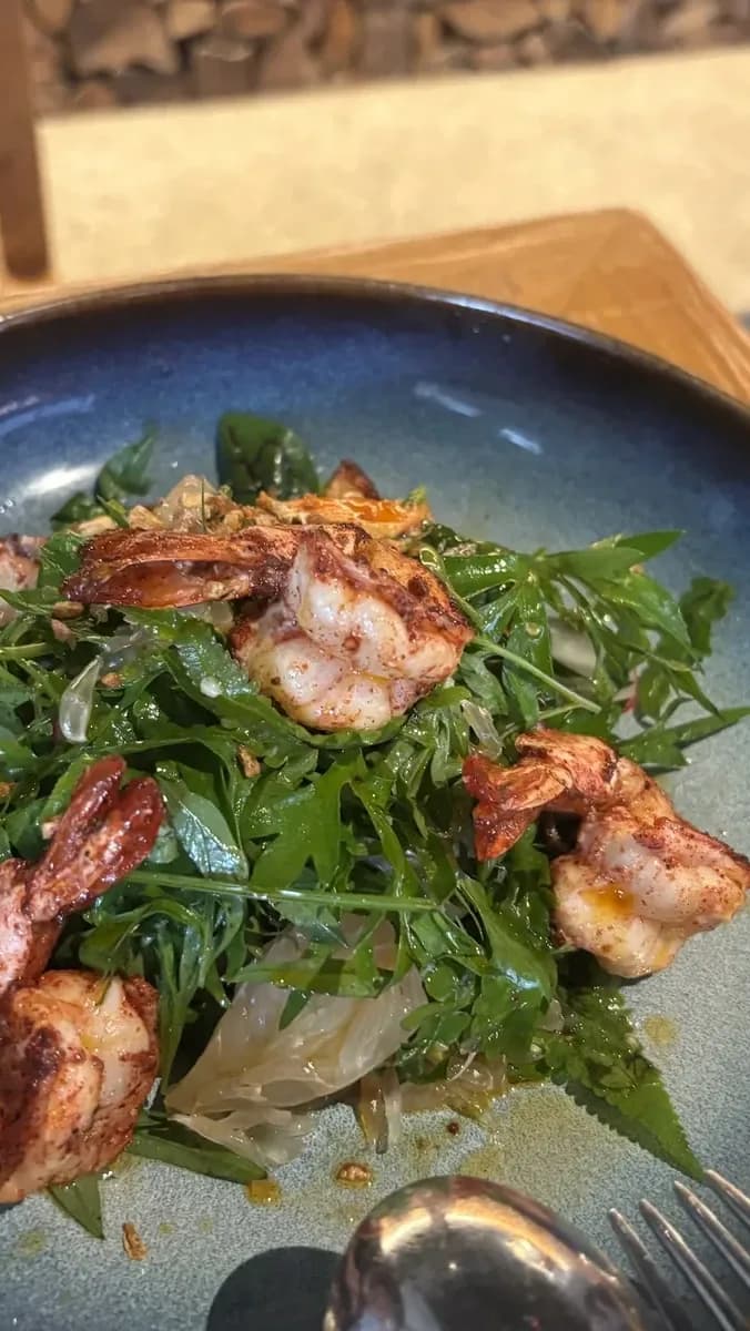 Watch the chef craft your meal