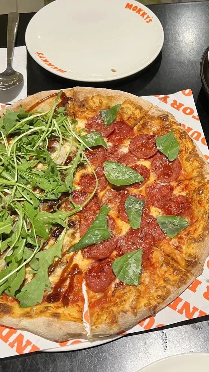 Cheesy pizza slices at Mokky's