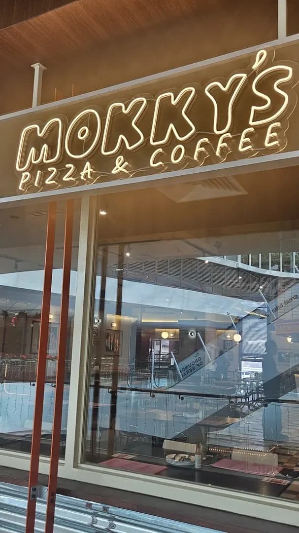 Cheesy pizza slices at Mokky's photo 2