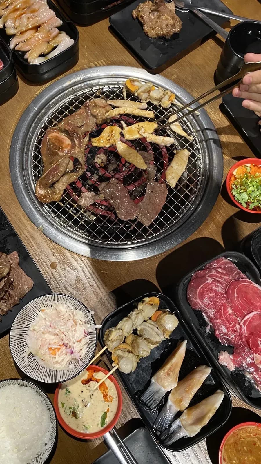 Watch the meat grill at your table